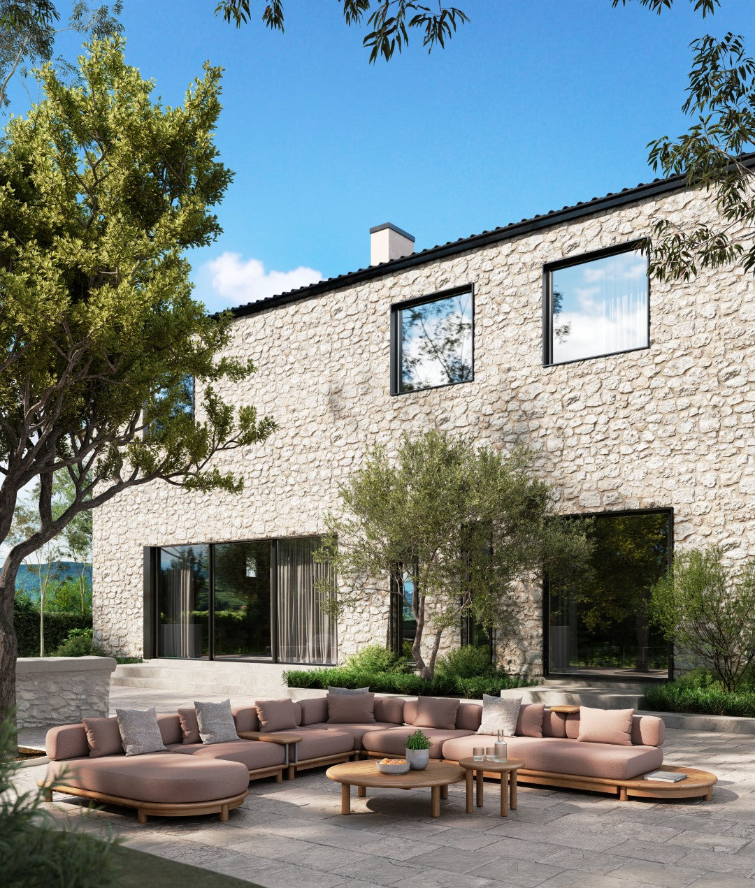 Modern outdoor seating area with a stone building in the background