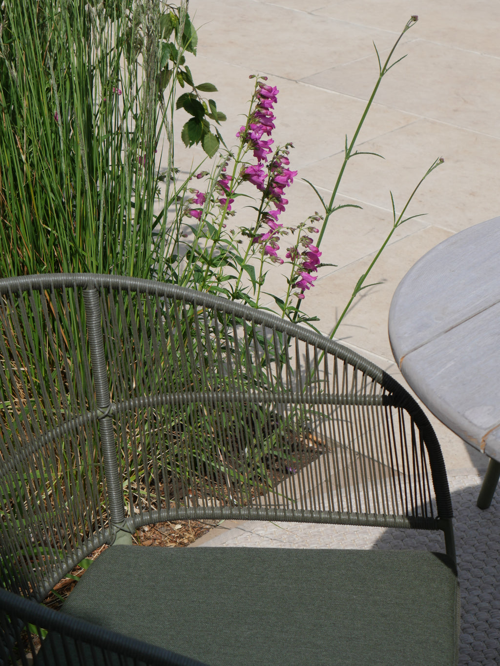 Arda Teak Dining Table with Kane Stackable Chairs