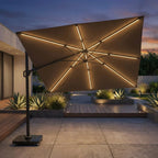 Large outdoor umbrella with LED lights in a garden setting